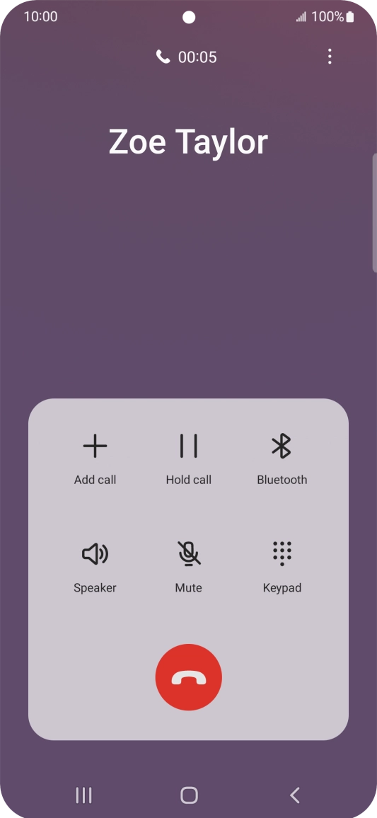 Press the end call icon.