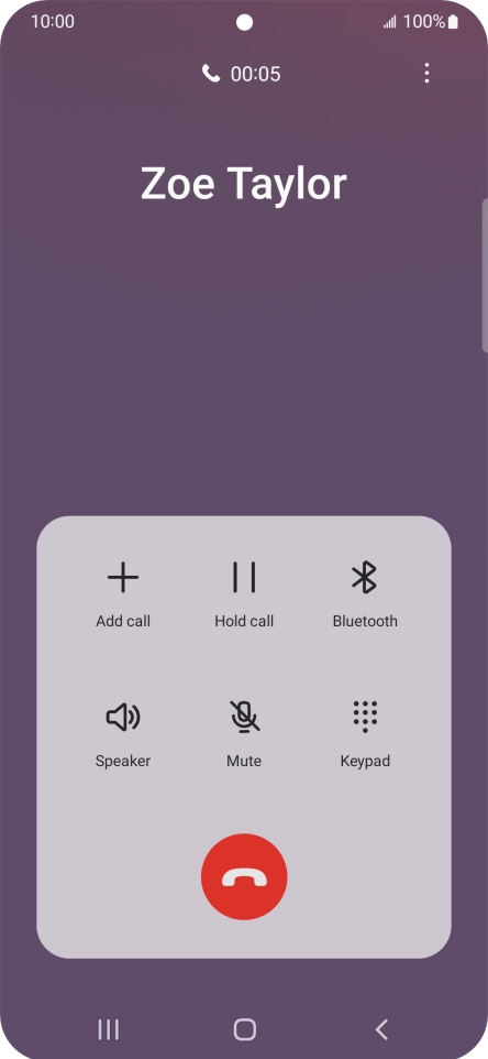 Press the end call icon.