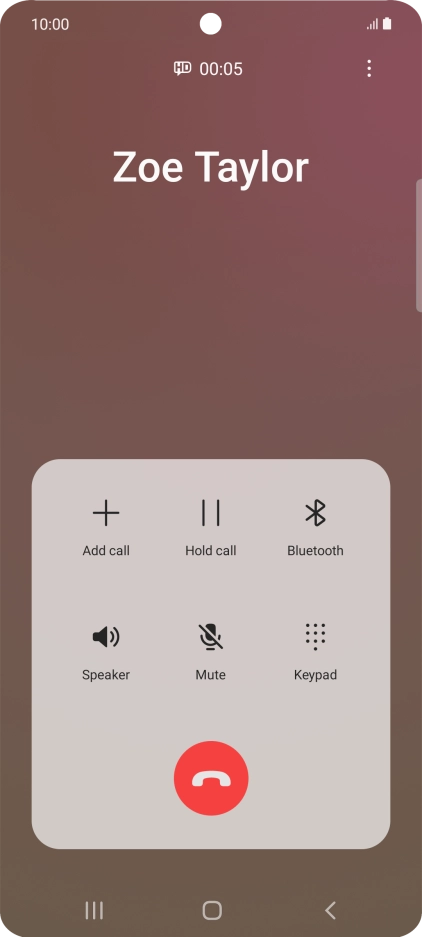 Press the end call icon.