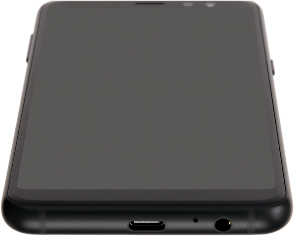 Connect the charger to the socket and to a wall socket.