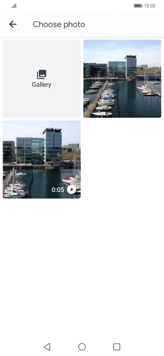 Press Gallery and go to the required folder.
