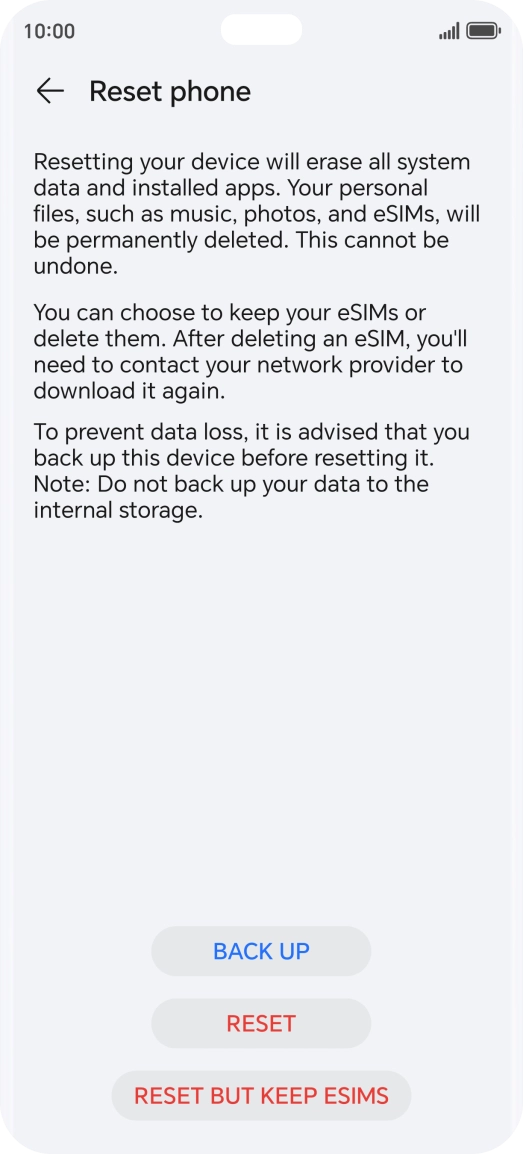 Press RESET. Wait a moment while the factory default settings are restored. Follow the instructions on the screen to set up your phone and prepare it for use.