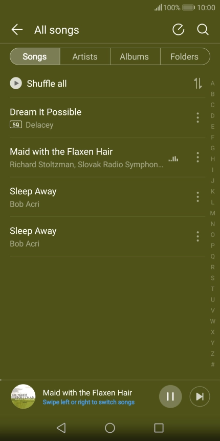Press the song title at the bottom of the screen.