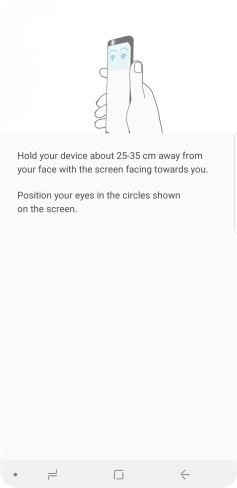 Follow the instructions on the screen to create the phone lock code using iris scanning.