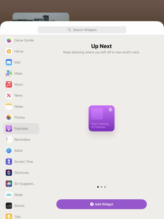Slide your finger right or left on the screen to select the required widget size.