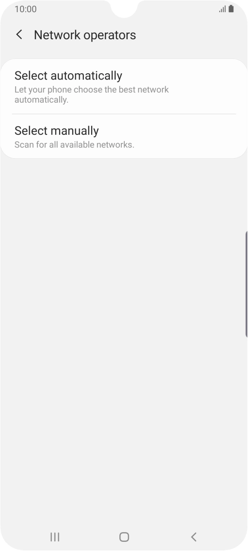 Press Select manually and your phone will search for networks.