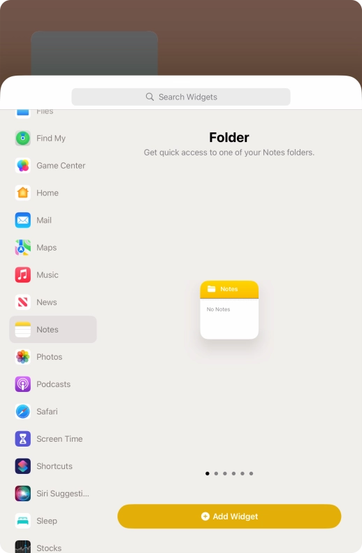 Slide your finger right or left on the screen to select the required widget size.