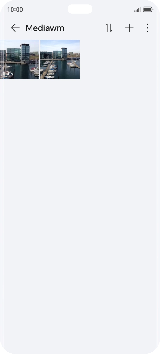 Press and hold any picture or video.