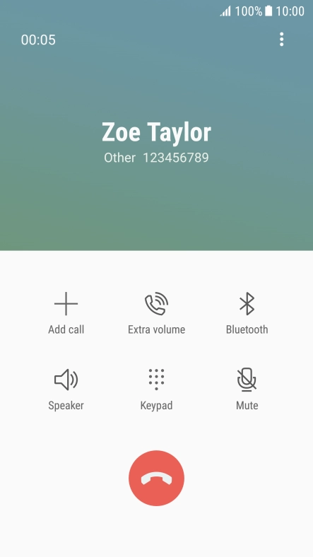 Press the end call icon.