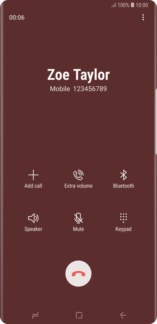 Press the end call icon.