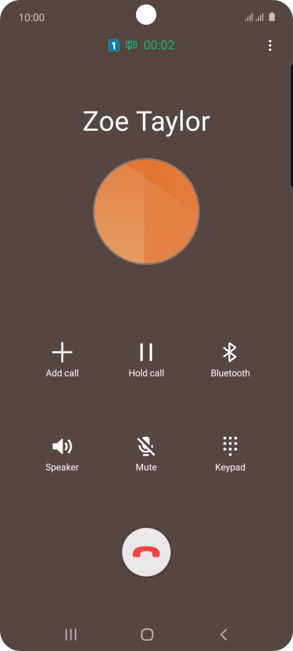 Press the end call icon.