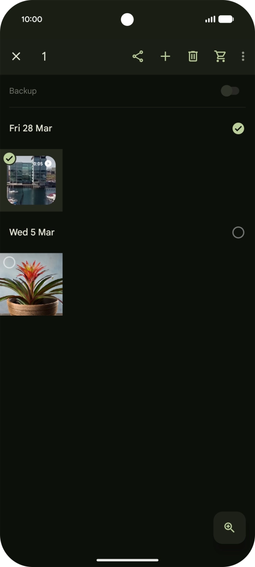 Press the required pictures or videos to select them.