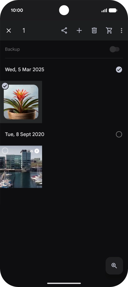 Press the required pictures or videos to select them.