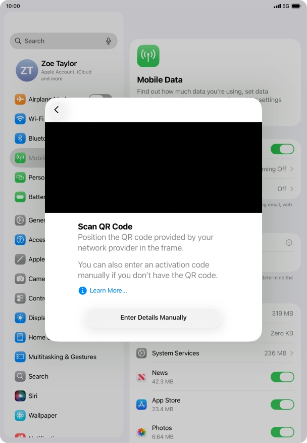 Place the QR code you've received inside the tablet camera frame to scan the code.