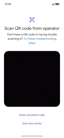 Place the QR code you've received inside the phone camera frame to scan the code. Your eSIM is transferred to your new phone over the internet.