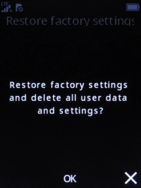 Press the Navigation key. Wait a moment while the factory default settings are restored. Follow the instructions on the screen to set up your phone and prepare it for use.