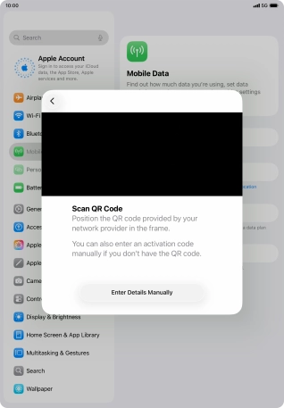 Place the QR code you've received inside the tablet camera frame to scan the code.