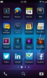 Slide your finger left across the display to open the main menu.Press Facebook.