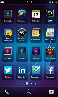 Slide your finger left across the display to open the main menu.Press Music.