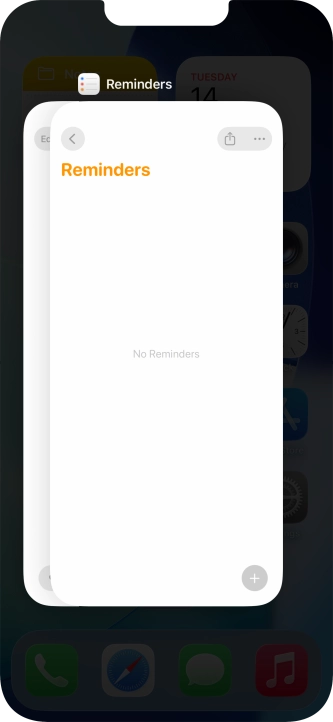Slide upwards on the required application to end it.