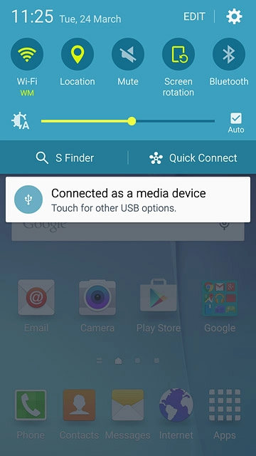 Slide your finger down the display starting from the top edge of your phone.Press Connected as a media device.