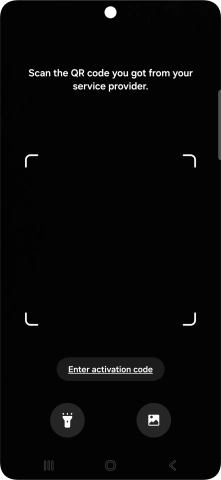 Place the QR code you've received inside the phone camera frame to scan the code. Your eSIM is transferred to your new phone over the internet.