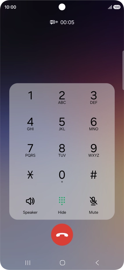 Press the end call icon.