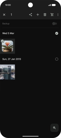Press the required pictures or videos to select them.