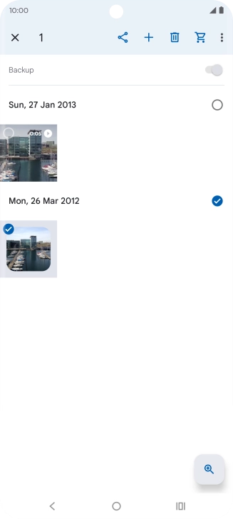 Press the required pictures or videos to select them.