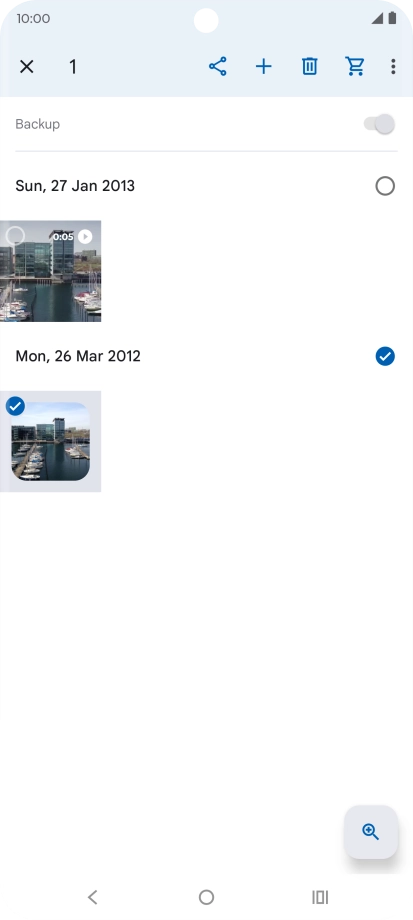 Press the required pictures or videos to select them.