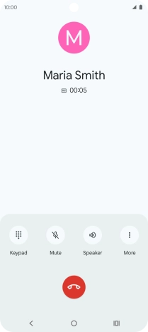 Press the end call icon.