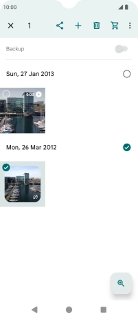 Press the required pictures or videos to select them.