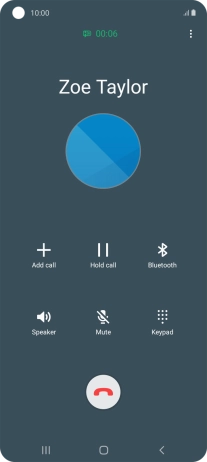 Press the end call icon.