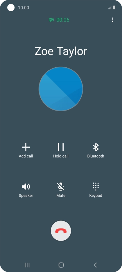 Press the end call icon.