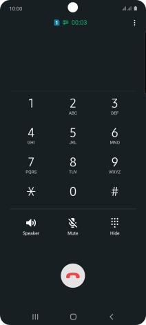 Press the end call icon.