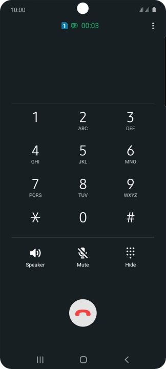 Press the end call icon.
