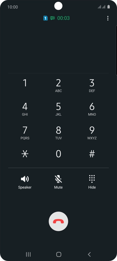 Press the end call icon.