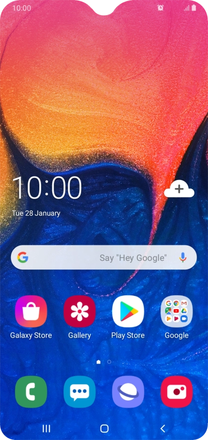 The alarm icon shows that the alarm is set.