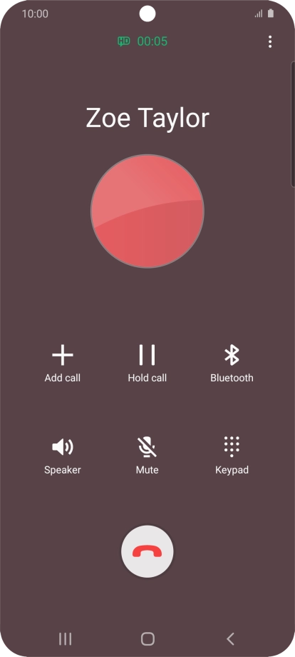 Press the end call icon.