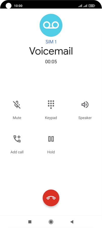 Press the end call icon.