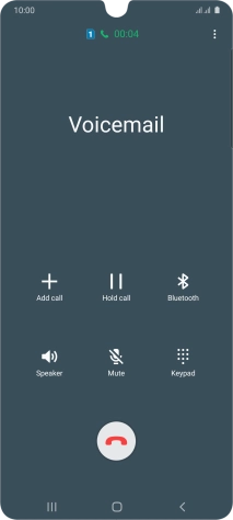 Press the end call icon.