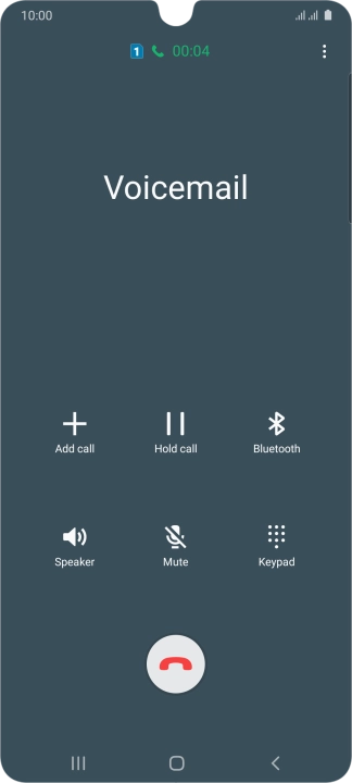 Press the end call icon.