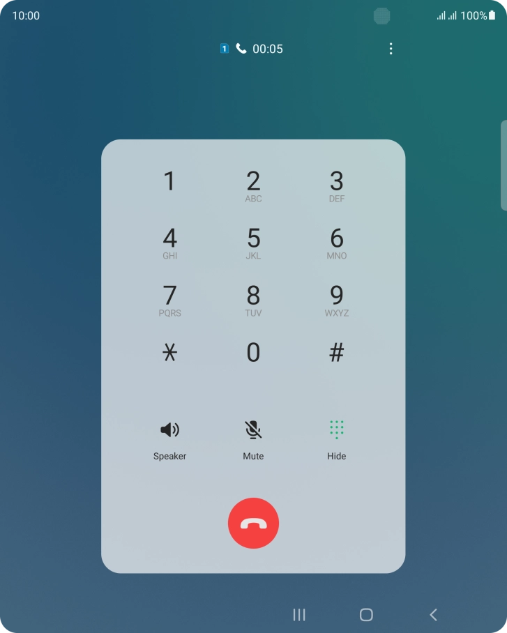 Press the end call icon.