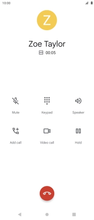Press the end call icon.