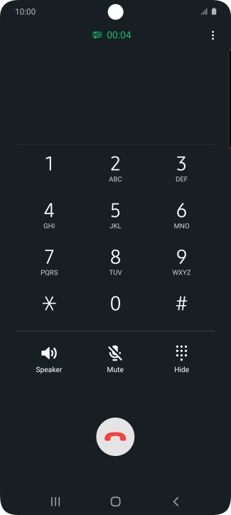Press the end call icon.