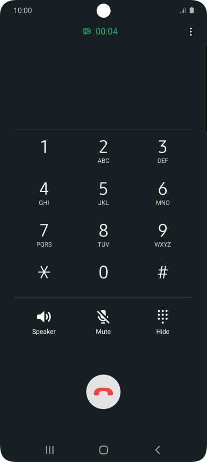 Press the end call icon.