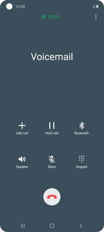 Press the end call icon.