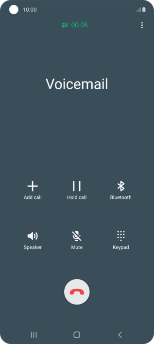 Press the end call icon.