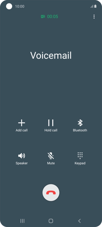 Press the end call icon.