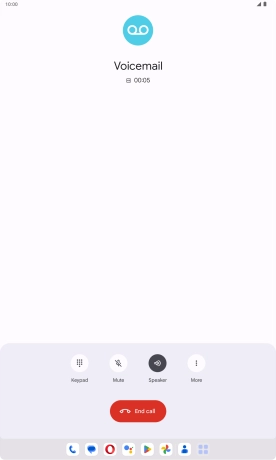 Press the end call icon.